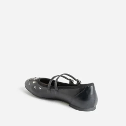 Babies noires décor œillets et clous