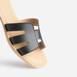 Mule noire en cuir grainé