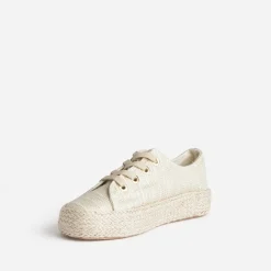 Tennis dorée en toile brodée