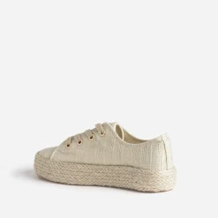 Tennis dorée en toile brodée